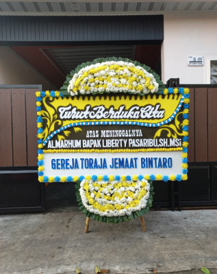 Papan Bunga Duka di Edera