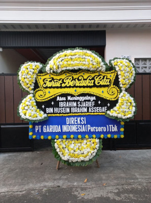 Papan Bunga Duka di Edera