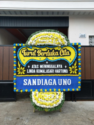 Papan Bunga Duka di Edera